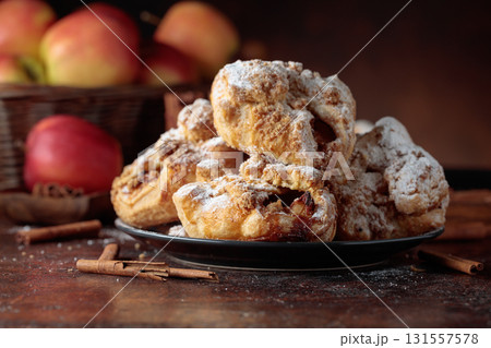 Homemade mini apple strudels with apples and cinnamon. Homemade mini apple strudels with apples and cinnamon. 131557578