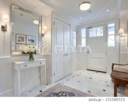 Elegant entrance with mirror, uncluttered space 131560723