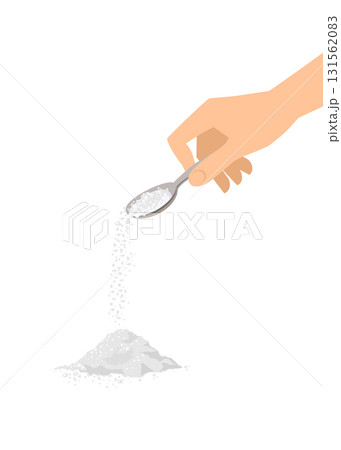 Salt pouring from a metal spoon isolated on a blue background 131562083