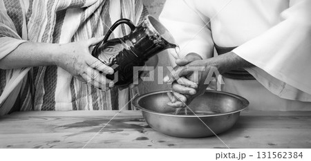 Woman pour water on hands 131562384