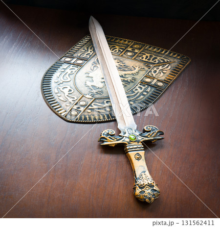 Iron shield and sword on the table 131562411