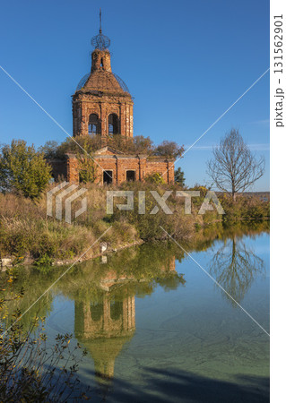 Ruins of Transfiguration Church in Zherdevo, Tula region, reflected in water Ruins of Transfiguration Church in Zherdevo, Tula region, reflected in water 131562901