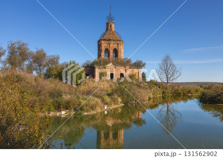 Ruins of Transfiguration Church in Zherdevo, Tula region, reflected in water 131562902