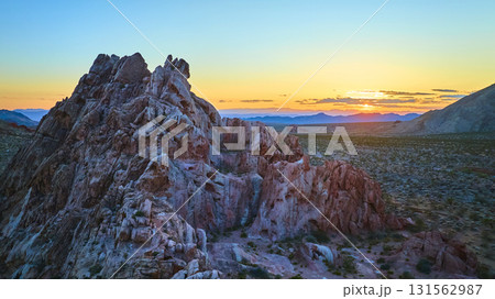 Aerial Golden Hour Desert Landscape With Rugged Sandstone Formations And Sunset Aerial Golden Hour Desert Landscape With Rugged Sandstone Formations And Sunset 131562987
