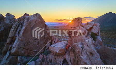 Aerial Dramatic Rock Formations and Desert Landscape at Sunset Golden Hour 131563003