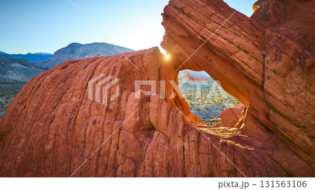 Sunburst Through Red Rock Arch Formation At Gold Butte National Monument Sunburst Through Red Rock Arch Formation At Gold Butte National Monument 131563106