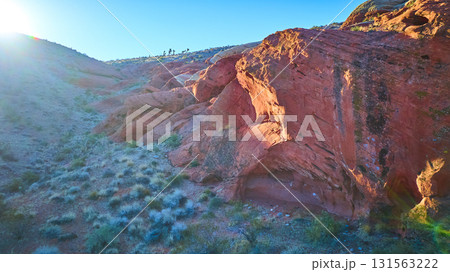 Aerial Red Rock Formations and Sunlit Desert Landscape at Golden Hour 131563222