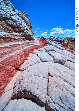 Layered Sandstone Formations and Vibrant Striations in White Pocket Arizona 131563492