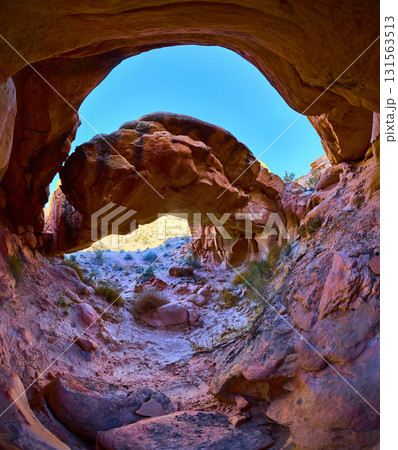 Panoramic View of Sandstone Arch Formation and Desert Landscape in Nevada Panoramic View of Sandstone Arch Formation and Desert Landscape in Nevada 131563513