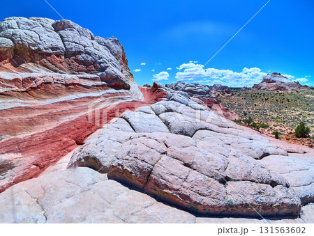 White Pocket Arizona Swirling Sandstone Formations and High Desert Panorama White Pocket Arizona Swirling Sandstone Formations and High Desert Panorama 131563602