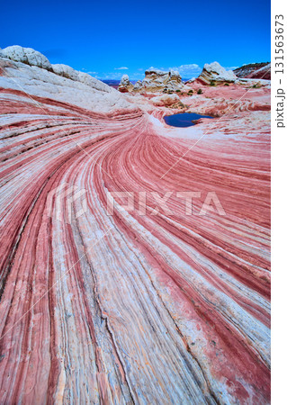 Swirling Sandstone Striations and Reflective Pool White Pocket Arizona Wide Angle 131563673