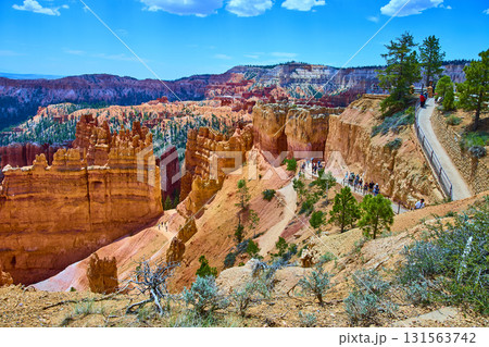 Bryce Canyon Hoodoos Sunset Point Trail with Visitors and Pine Trees Utah 131563742