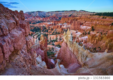 Bryce Canyon Hoodoos Sunrise View with Colorful Rock Formations and Pine Trees 131563860