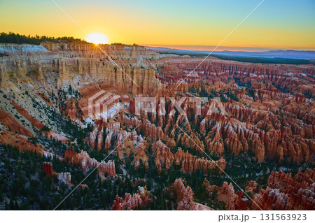 Bryce Canyon National Park Hoodoos at Sunset with Sunburst and Golden Hour Light 131563923