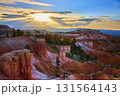 Bryce Canyon National Park Hoodoo Formations at Sunset with Pine Trees and Dramatic Sky 131564143