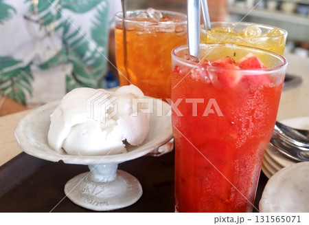 Coconut Ice Cream with Tropical Punch Beverage Coconut Ice Cream with Tropical Punch Beverage 131565071