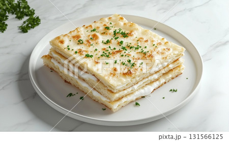 Flat bread crispy crunchy biscuit stack for salty snack food on plate Flat bread crispy crunchy biscuit stack for salty snack food on plate 131566125