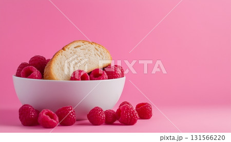 Raspberry fresh organic fruit and bread slice on ceramic white bowl Raspberry fresh organic fruit and bread slice on ceramic white bowl 131566220