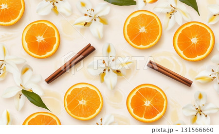 Orange slice and vanilla flower fresh citrus fruit and natural essential Orange slice and vanilla flower fresh citrus fruit and natural essential 131566660