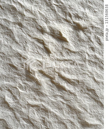 Image shows textured surface of off white mulberry paper with soft shadows, highlighting its fibrous and natural appearance 131568638