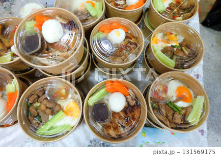 Lunch box set.Cooked food in paper eco-friendly containers. Lunch box set.Cooked food in paper eco-friendly containers. 131569175
