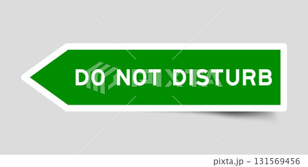 Green color arrow shape sticker label with word do not disturb on gray background Green color arrow shape sticker label with word do not disturb on gray background 131569456
