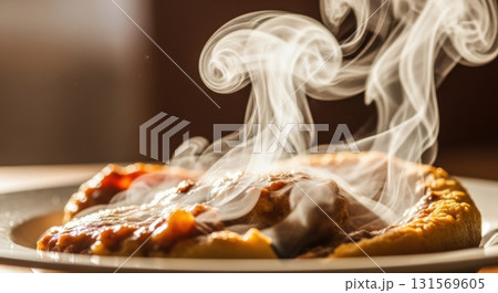 Steaming delicious pie freshly baked on a plate in warm sunlight 131569605