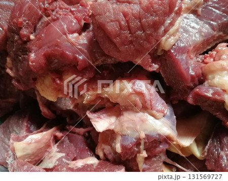 Raw beef steak meat. Delicious mixed Kobe and wagyu beef meat pieces to make famous recipe like barbeque, picanha, bourguignon, goulash, gourmet, stroganoff, ragout etc 131569727