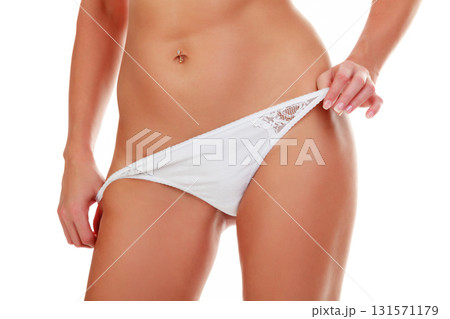 Sexy female body in white panties, isolated on white background 131571179