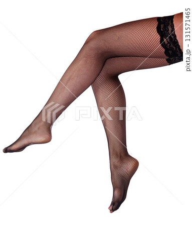 Beautiful long woman's legs in black net pantyhose, isolated on white background 131571465