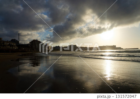 Breathtaking sunrise on beach in Canary Islands, sunny cloudy blue sky with copy space, El Medano, Tenerife 131572047