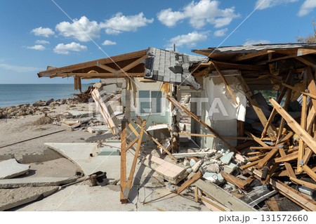 Destroyed houses on ocean shore after hurricane Milton landfall. Natural disaster consequences on Manasota Key, Florida. Storm surge severe damage 131572660