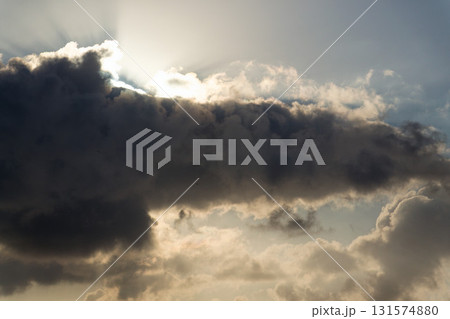 Sky with dramatic beautiful white fluffy clouds viewed from airplane, blue sky, aerial view, copy space, travel concept 131574880