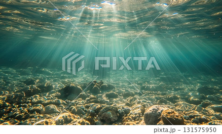 Sunlight rays underwater with sparkling reflections Sunlight rays underwater with sparkling reflections 131575950
