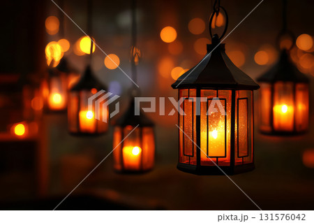 Vintage lantern glowing at night with blurred lights in background Vintage lantern glowing at night with blurred lights in background 131576042
