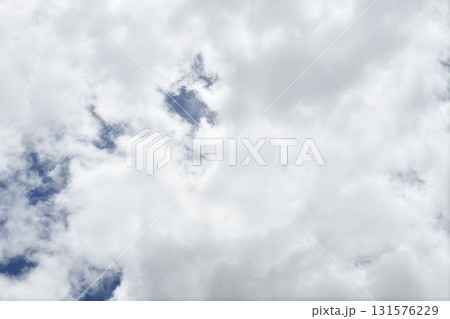 White cloud sky blue peaceful atmosphere with soft fluffy cloud formation creating calm natural scene White cloud sky blue peaceful atmosphere with soft fluffy cloud formation creating calm natural scene 131576229