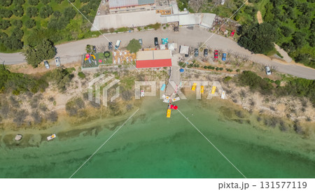Lake Kournas in Crete aerial view of pedal boat rental clear water and scenic Greek nature. Lake Kournas in Crete aerial view of pedal boat rental clear water and scenic Greek nature. 131577119