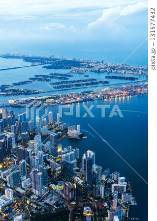 Aerial view of Miami skyline with skyscrapers at Downtown Brickell and Miami Beach at night  131577432
