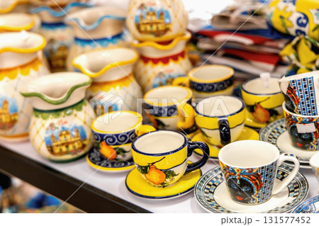 Sicilian souvenir cups and decorative ceramic jugs Sicilian souvenir cups and decorative ceramic jugs 131577452