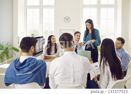 Office Team Conducting Group Meeting Or Training Session Office Team Conducting Group Meeting Or Training Session 131577523