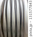Electric High Voltage Cable Coiled on a Reel Ready for Installation on Construction Site 131577843