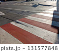 Pedestrian Markings on a Busy Intersection With Sunlight Shining in the Afternoon 131577848