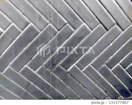 Black Zigzag Tile Pattern With Glossy Finish Ideal for Modern Interior Design Projects 131577867