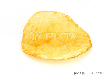 A piece of potato chip is shown on a white background 131577915