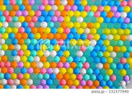 A colorful mosaic of small balls in various colors 131577940