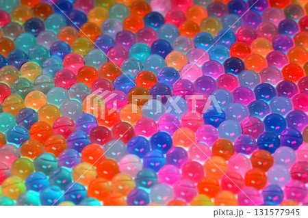 A colorful array of small, clear, and colorful balls A colorful array of small, clear, and colorful balls 131577945