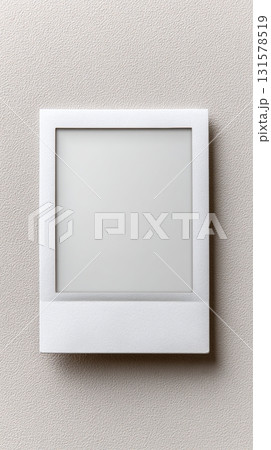 A simple mockup featuring a blank Polaroid frame on a clean white background, perfect for displaying creative designs or personal photos A simple mockup featuring a blank Polaroid frame on a clean white background, perfect for displaying creative designs or personal photos 131578519