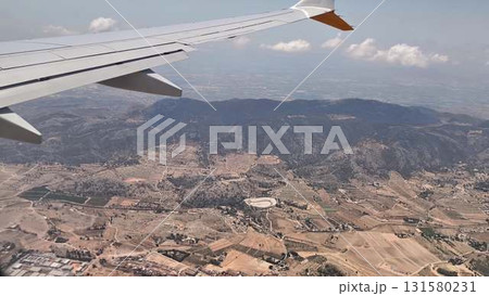 A Stunning and Scenic Aerial View of the Mountainous Landscape as Seen from an Airplane 131580231