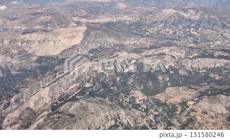A stunning Aerial View of Mountainous Terrain showcasing a variety of Rocky Landscapes 131580246