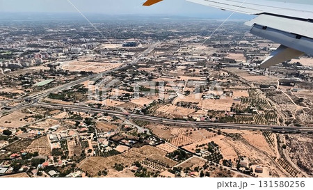 An Impressive Aerial View of an Urban Landscape Captured During Flight Approach to Land 131580256